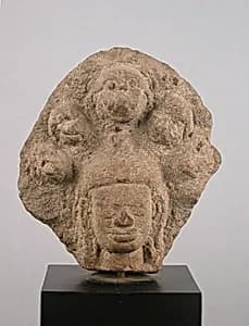 Head of a Buddha by Unknown Artist