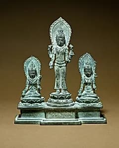 Standing Four-Armed Avalokiteshvara Flanked by Tara and Bhrikuti(?) by Unknown Artist