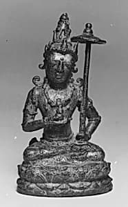 Seated Male Deity Holding a Parasol and an Unidentified Object by Unknown Artist