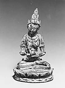 Seated Female Deity Holding a Conch and Branch (?) by Unknown Artist