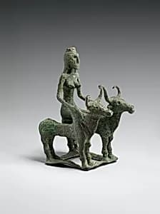 Woman Riding Two Brahman Bulls by Unknown Artist