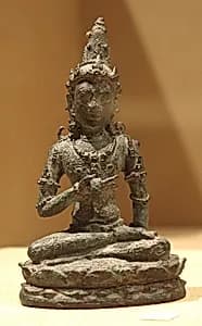 Seated Male Deity Holding a Manuscript(?) by Unknown Artist