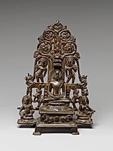 Enthroned Jina Attended by a Yaksha, a Yakshi, and Chauri-Bearers by Unknown Artist