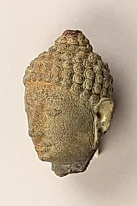 Head of Buddha by Unknown Artist