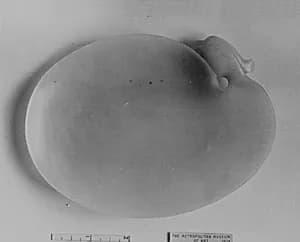 Dish with bird’s head by Unknown Artist