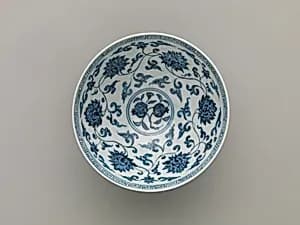Bowl with pomegranates, lotus scrolls, and chrysanthemum petals by Unknown Artist