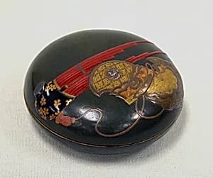 Round Box with Design of Bugaku Dance Hat and Musical Instrument by Yamada Jōkasai (1681–1704)