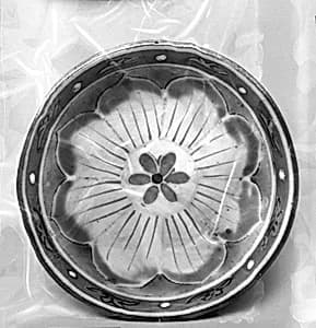 Saucer with floral pattern by Unknown Artist