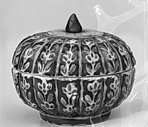 Covered box with floral pattern by Unknown Artist