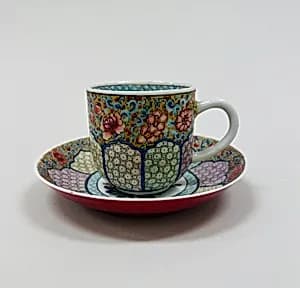 Cup and saucer with floral patterns by Unknown Artist
