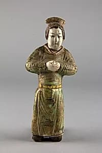 Figure of a standing servant by Unknown Artist