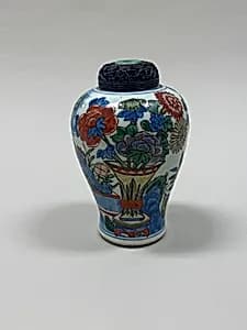 Jar with flowers by Unknown Artist