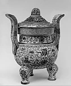 Tripod incense burner with Buddhist auspicious symbols by Unknown Artist