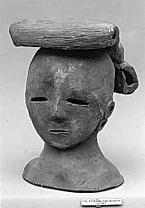Head of a Female Haniwa Figure with Headdress by Unknown Artist