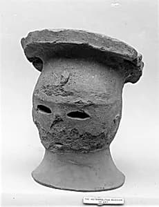 Head of a Female Haniwa Figure with Headdress by Unknown Artist