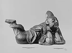 Alcove ornament in form of a man lying down by Unknown Artist