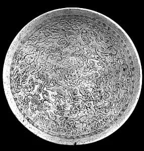 Bowl with boys amid floral sprays by Unknown Artist