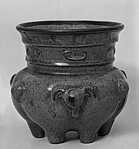 Tripod vessel with three ram heads by Unknown Artist