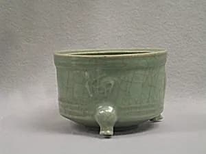 Incense burner with characters "longevity, mountain, fortune, sea" (shou shan fu hai) by Unknown Artist