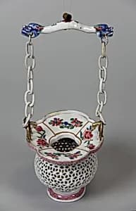 Hanging flower basket by Unknown Artist