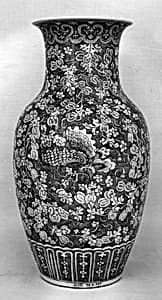 Vase with butterflies amid melon vines by Unknown Artist