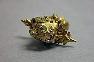 Ear Ornament with Makara Motif by Unknown Artist