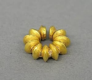 Ear Clip Composed of Fused Discs by Unknown Artist