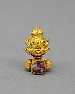 Pair of Ear Clips with Translucent Red Stone by Unknown Artist