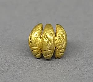 Ear Clip with Repeated Vegetable Motif by Unknown Artist