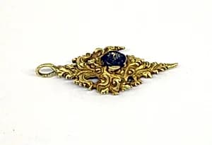 Pendant with Inlaid Stones Surrounded by Foliate Motif by Unknown Artist