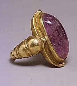 Ring with Large Purple Oval-Shaped Stone in Plain Mount by Unknown Artist