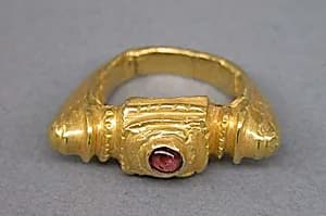 Ring with Reddish-purple Stone Set in Square Bezel by Unknown Artist