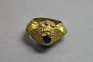 Ring with Purple Stone in Lotus-shaped Mount by Unknown Artist