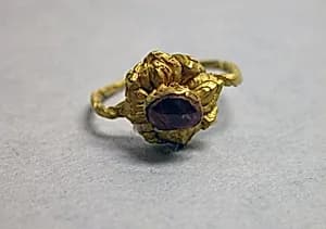 Ring with Purplse Stone set in Lotus Mount by Unknown Artist