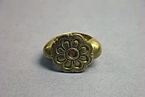 Stirrup-shaped Ring with Lotus Pattern on Bezel by Unknown Artist