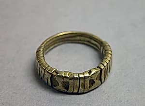 Ring Consisting of Three Bands Twisted Together by Unknown Artist