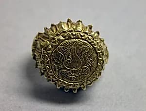 Stirrup-shaped Ring with Circular Bezel with Inscribed "Shankha" by Unknown Artist