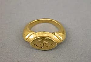 Stirrup-Shaped Ring with Oblong Bezel with Shankha by Unknown Artist
