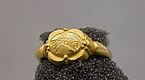 Ring with Quatrefoil-Shaped Bezel with Fish Motif by Unknown Artist
