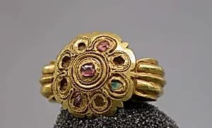 Stirrup-Shaped Ring with Stones Set in Circular Bezel by Unknown Artist