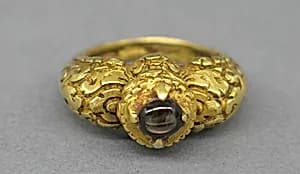 Stirrup-Shaped Ring with Stone and Foliate Designs by Unknown Artist
