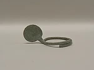Anklet with Large Spiral Attachment by Unknown Artist