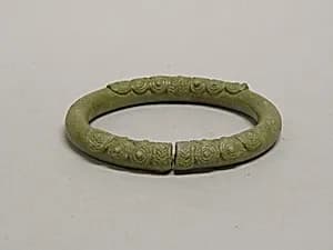 One from a Pair of Solid Anklets with Spiral Decoration by Unknown Artist