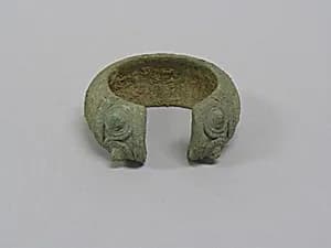 One from a Pair of Bracelets with Decorated Ends by Unknown Artist