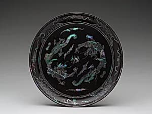 Round tray with decoration of dragons and clouds by Unknown Artist