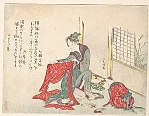 Woman Folding Cloth by Katsushika Hokusai