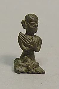 Squatting Figure by Unknown Artist