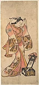 Sanjō Kantarō as a Woman Arranging Her Hair Before a Lacquer Mirror by Torii Kiyomasu II