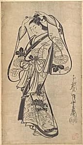 Courtesan Placing a Hairpin in Her Hair by Kaigetsudō Anchi