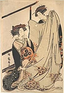 Two Beauties Looking at Kimono by Isoda Koryūsai